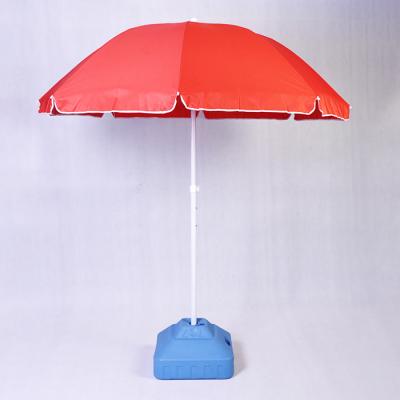 Red beach umbrella with tilt Red beach umbrella with tilt
