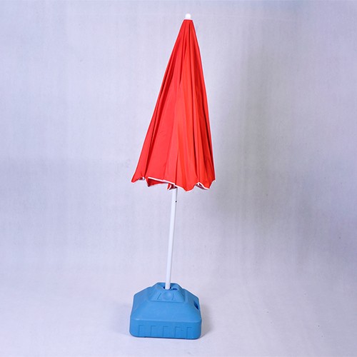 Red beach umbrella with tilt