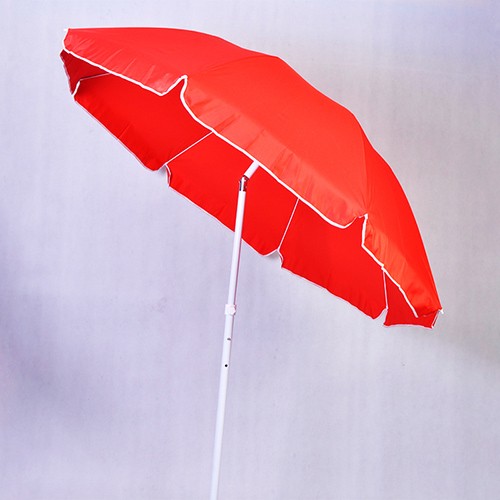 Red beach umbrella with tilt